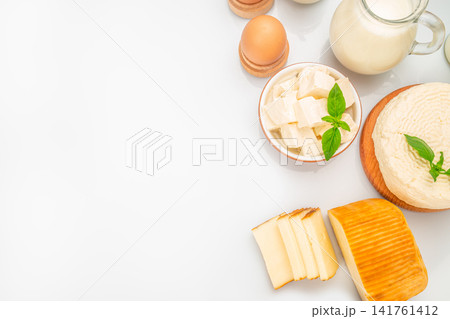 Dairy products and cheese assortment with copy space Dairy products and cheese assortment with copy space 141761412