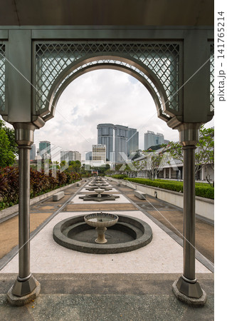 Archway view of fountain courtyard at Masjid Negara National Mosque in Kuala Lumpur, Malaysia Archway view of fountain courtyard at Masjid Negara National Mosque in Kuala Lumpur, Malaysia 141765214