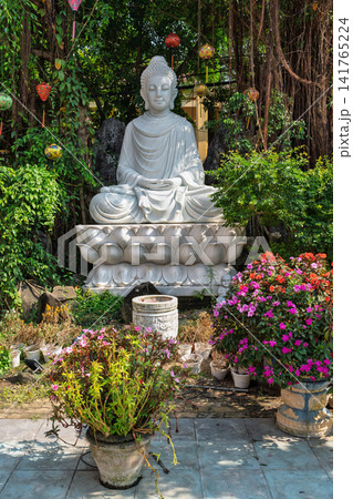 White Buddha statue at Phap Bao Pagoda in Hoi An, Vietnam White Buddha statue at Phap Bao Pagoda in Hoi An, Vietnam 141765224