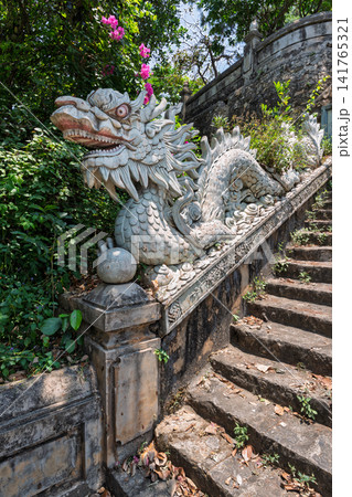 Traditional stone dragon sculpture on a temple staircase at Linh Ung Pagoda in Da Nang, Vietnam 141765321