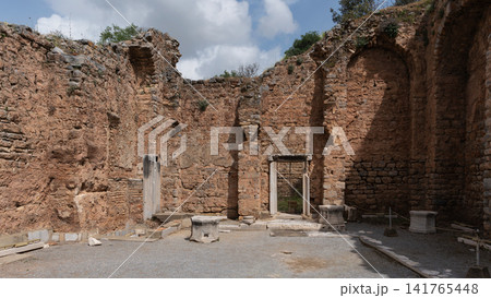 Ancient Roman ruins with weathered stone walls and doorway, Ephesus, Selcuk, Turkey Ancient Roman ruins with weathered stone walls and doorway, Ephesus, Selcuk, Turkey 141765448