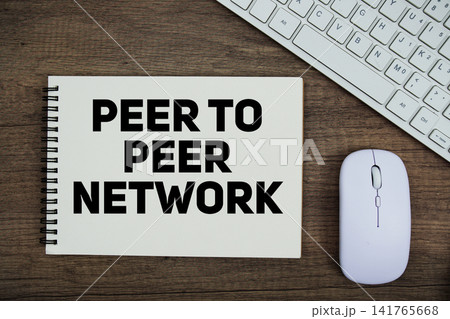 Peer To Peer Network message with keyboard and optical mouse on wooden background Peer To Peer Network message with keyboard and optical mouse on wooden background 141765668