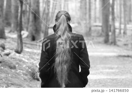 Young woman with long hair 141766850