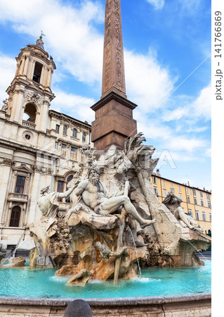 Vertical view of the famous Fountain of the Four Rivers in Piazza Navona, Rome. Magnificent Baroque sculpture and most recognizable cultural landmarks. 141766869
