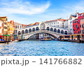 The iconic Rialto Bridge spanning the Grand Canal in Venice, Italy. A timeless symbol of Venetian architecture and most visited tourist attractions. 141766882