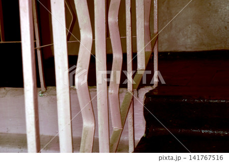 Metal railing grille in the entrance hall. Metal railing grille in the entrance hall. 141767516
