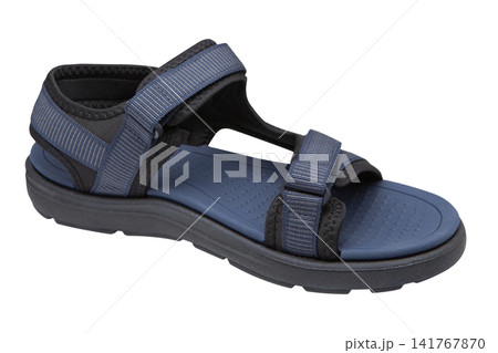 Men's navy blue and black sport sandals isolated on white background. Casual outdoor hiking strappy shoes with velcro, high angle view. Men's navy blue and black sport sandals isolated on white background. Casual outdoor hiking strappy shoes with velcro, high angle view. 141767870