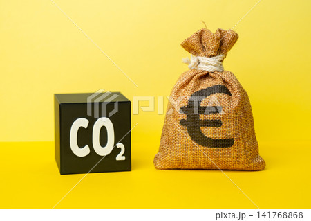 A CO2 cube and a euro money bag. Waste recycling and profit generation. Recycling grants. Reducing environmental impact while generating income. Increase in the cost of emission quotas for enterprises A CO2 cube and a euro money bag. Waste recycling and profit generation. Recycling grants. Reducing environmental impact while generating income. Increase in the cost of emission quotas for enterprises 141768868