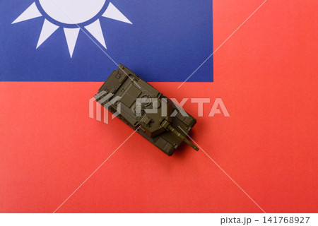 A tank on the taiwanese flag as a conceptual backdrop representing defense 141768927