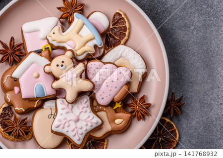Gingerbread as a Christmas staple, sweet biscuits for the holiday. Gingerbread as a background 141768932