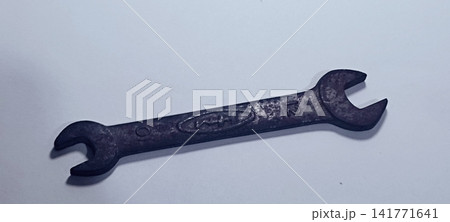 Vintage Double-Open-Ended Steel Wrench (Size 10-12 mm) on White Background Vintage Double-Open-Ended Steel Wrench (Size 10-12 mm) on White Background 141771641