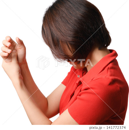 Asian woman red shirt hand gesture isolated portrait showing distress with raised arm and covered face against transparency background 141772374
