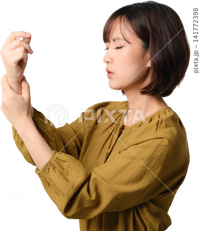 Asian woman profile isolated hand gesture closed eye mustard blouse against transparency background showing calm focus during delicate movement 141772398