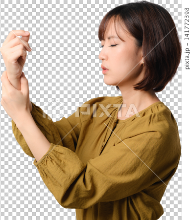 Asian woman profile isolated hand gesture closed eye mustard blouse against transparency background showing calm focus during delicate movement 141772398