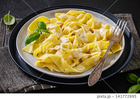 Fettuccine al Formaggio, Italian Pasta on a plate Fettuccine al Formaggio, Italian Pasta on a plate 141772695