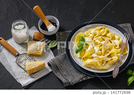 Fettuccine Pasta Covered in Cream Cheese Sauce 141772696