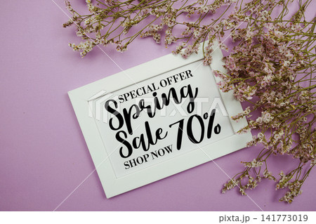 Spring Sale 70% Promotion and Marketing with flowers bouquet decoration on purple background Spring Sale 70% Promotion and Marketing with flowers bouquet decoration on purple background 141773019