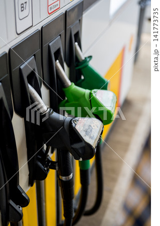 Corby, Northamptonshire, UK - August 2, 2026: fuel pumps offering diesel and petrol at a Shell petrol station in Corby, Northamptonshire, England, UK Corby, Northamptonshire, UK - August 2, 2026: fuel pumps offering diesel and petrol at a Shell petrol station in Corby, Northamptonshire, England, UK 141773735