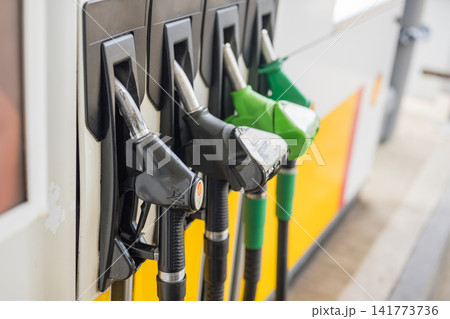 Corby, Northamptonshire, UK - August 2, 2026: fuel pumps offering diesel and petrol at a Shell petrol station in Corby, Northamptonshire, England, UK Corby, Northamptonshire, UK - August 2, 2026: fuel pumps offering diesel and petrol at a Shell petrol station in Corby, Northamptonshire, England, UK 141773736