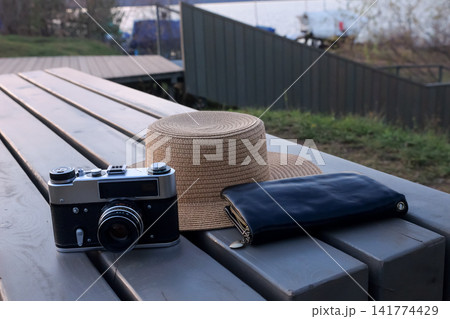 Vintage Camera Case. Pretrip Arrangement Displaying Film Gear And Nostalgic Atmosphere. Arrangement Showcasing Retro Photography Equipment With Sunlight And Nostalgic Mood During Preparation 141774429