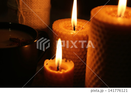 Cozy Lit Beeswax Candles and Spiced Beverage Cozy Lit Beeswax Candles and Spiced Beverage 141776121