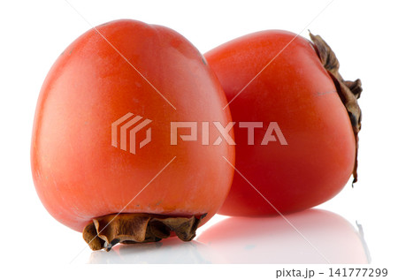 Red ripe persimmons Red ripe persimmons 141777299