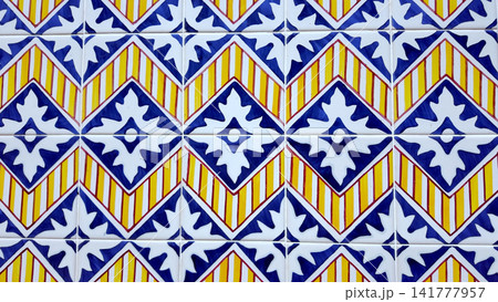 Vibrant geometric patterned Portuguese azulejo wall tiles Vibrant geometric patterned Portuguese azulejo wall tiles 141777957