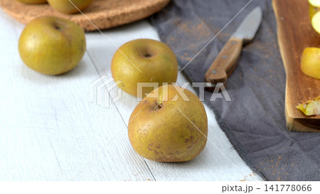 Fresh Russet Apples on a Rustic Tabletop Fresh Russet Apples on a Rustic Tabletop 141778066