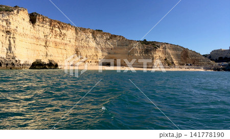 Scenic Limestone Cliffs and Sandy Beach in Algarve Portugal Scenic Limestone Cliffs and Sandy Beach in Algarve Portugal 141778190