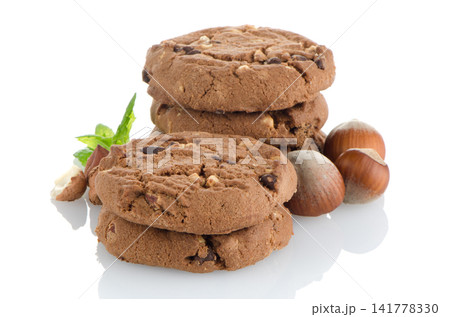 Chocolate cookies with mint leaves 141778330