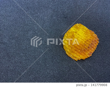 Burnt and charred junk food snack representing cooking mistake or imperfection Burnt and charred junk food snack representing cooking mistake or imperfection 141779908