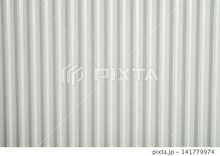 Heating season. Radiator heater provides warmth in interior setting 141779974