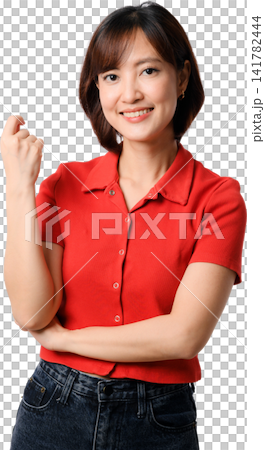 Asian woman smiling in red shirt with folded arms and raised hand showing friendly confidence against transparent background Asian woman smiling in red shirt with folded arms and raised hand showing friendly confidence against transparent background 141782444