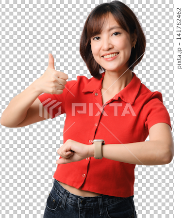 Asian woman giving thumbs up while checking wristwatch in red shirt isolated on transparent background Asian woman giving thumbs up while checking wristwatch in red shirt isolated on transparent background 141782462