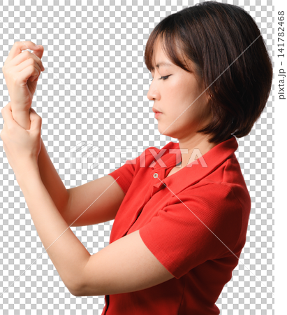 Asian woman examining wrist with focused expression against transparent background 141782468