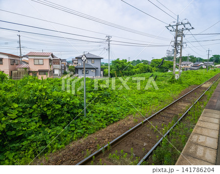Rural train track and platform at Yura Station in Hokuei Japan Rural train track and platform at Yura Station in Hokuei Japan 141786204