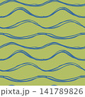 Seamless hand drawn wave pattern with blue wavy lines on yellow green lime background illustration. 141789826