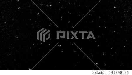 High speed close up of falling rain droplets isolated on a black background creating a realistic weather VFX overlay perfect for cinematic compositing visual effects motion graphics and atmospheric 141790176