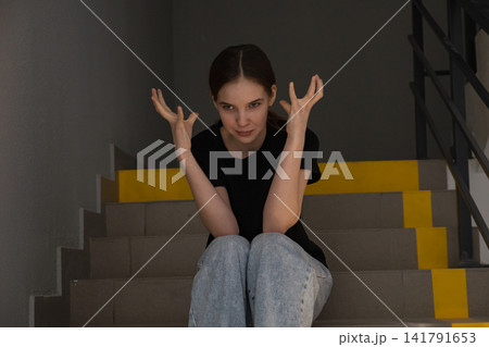Young woman suffering from depression and mental stress 141791653