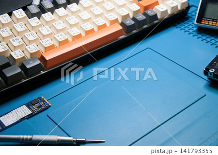 An aerial view photograph of the repair area where technicians are working. Text can be added. 141793355