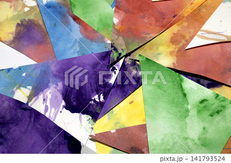 Triangle cut paper with paint splatters abstract rainbow background paint creative shapes Triangle cut paper with paint splatters abstract rainbow background paint creative shapes 141793524