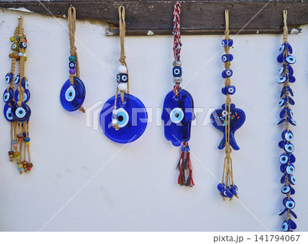 evil eye beads hanging on the wall evil eye beads hanging on the wall 141794067