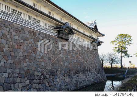Kanazawa Castle Stone Wall and Moat with White Turret Wooden Structure Kanazawa Castle Stone Wall and Moat with White Turret Wooden Structure 141794140