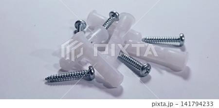 Plastic Wall Anchors and Metal Screws Set for Drywall and Masonry Mounting Plastic Wall Anchors and Metal Screws Set for Drywall and Masonry Mounting 141794233