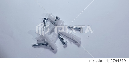 Plastic Wall Anchors and Metal Screws Set for Drywall and Masonry Mounting Plastic Wall Anchors and Metal Screws Set for Drywall and Masonry Mounting 141794239