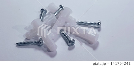 Plastic Wall Anchors and Metal Screws Set for Drywall and Masonry Mounting Plastic Wall Anchors and Metal Screws Set for Drywall and Masonry Mounting 141794241