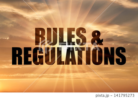 Rules & regulations concept glowing on sunset sky 141795273