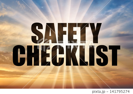 Safety checklist concept glowing on golden sunrise sky Safety checklist concept glowing on golden sunrise sky 141795274