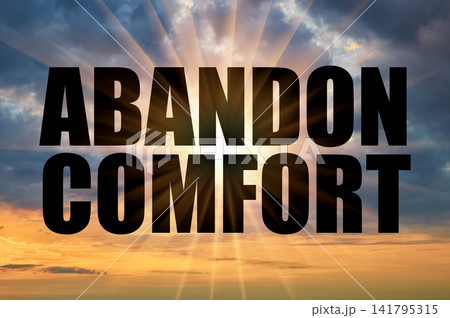 Text Abandon Comfort On A Background Of A Golden Evening Sky Text Abandon Comfort On A Background Of A Golden Evening Sky 141795315
