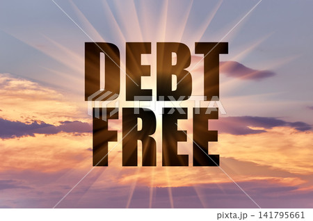 Debt free text against glowing sun rays in sunset sky Debt free text against glowing sun rays in sunset sky 141795661